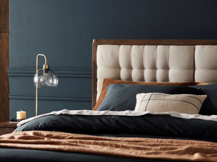Close up photo of modern bedroom containing Paris 3PCE Hardwood Bedroom Furniture Package in Rustic Walnut and Beige Fabric